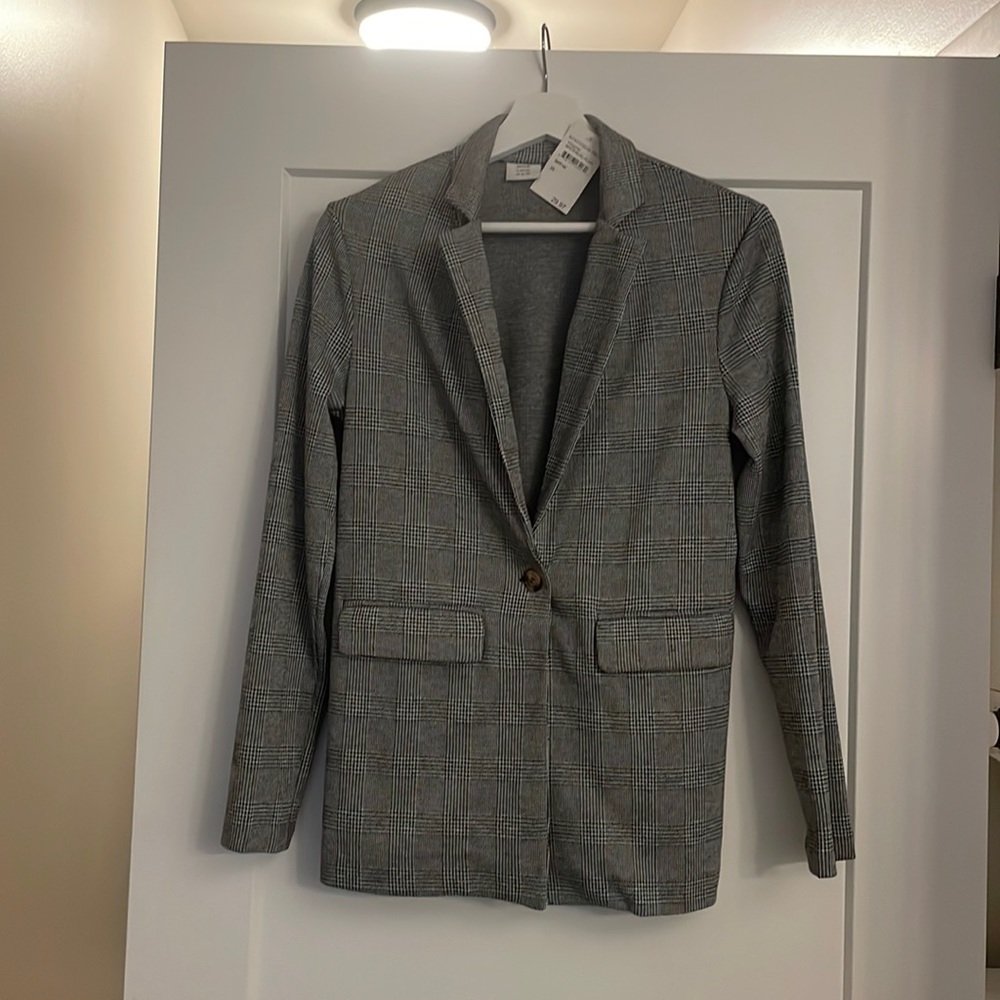 Checkered blazer, slightly oversized.